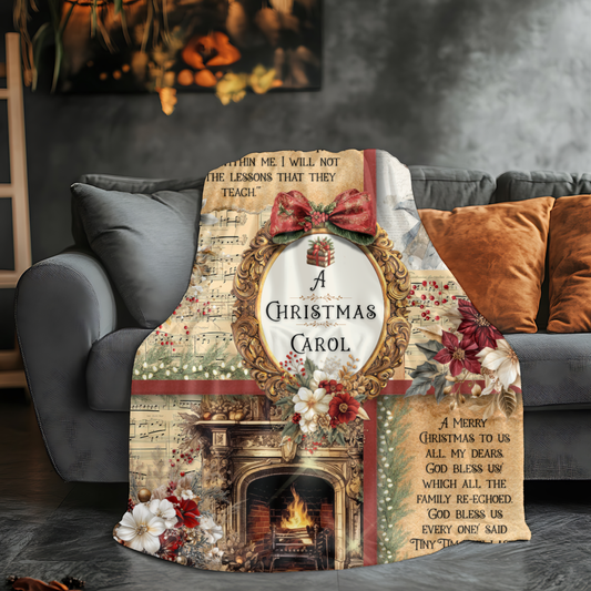 "A Christmas Carol" Sherpa Blanket draped over a grey sofa.