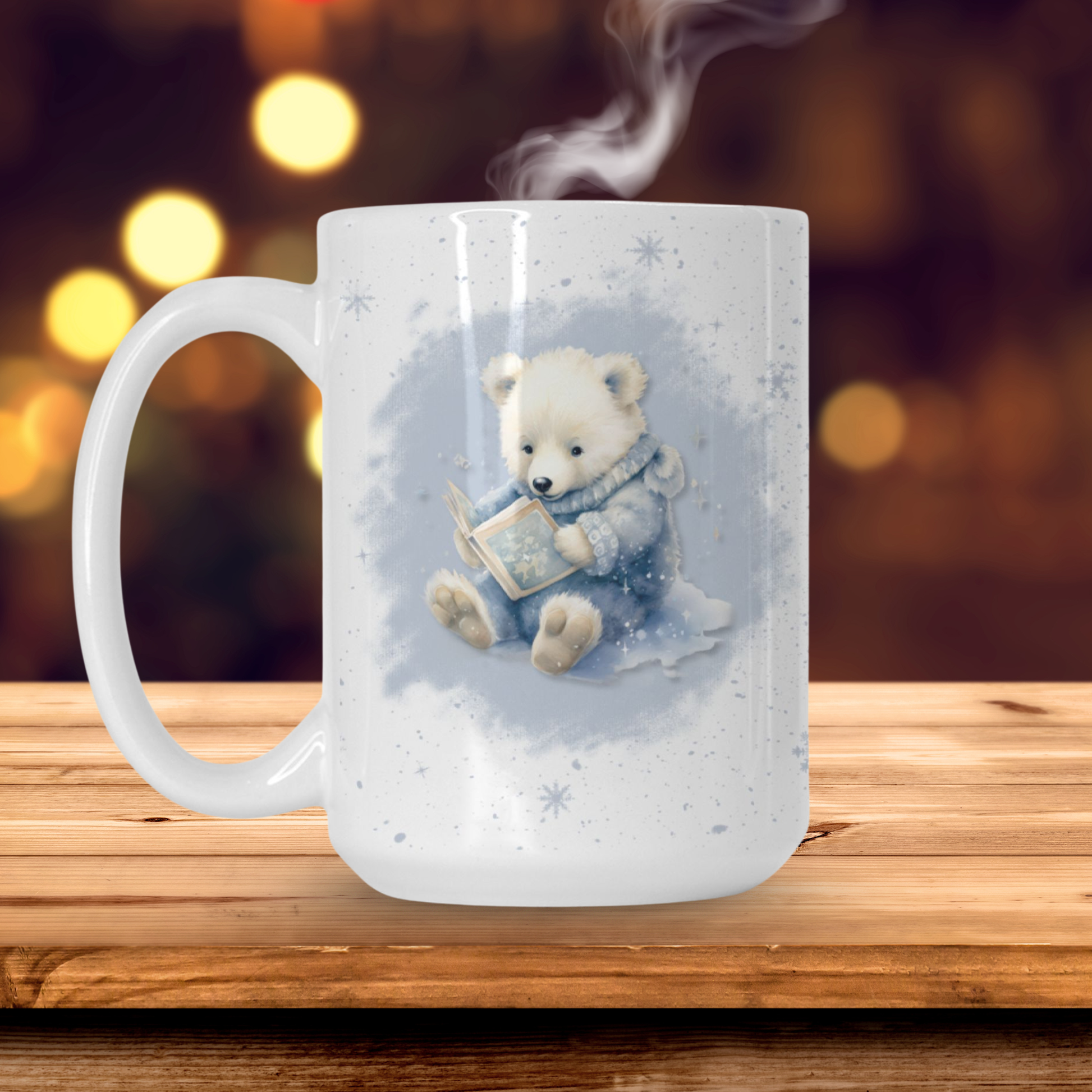 A white mug with a cuddly polar bear cub reading a book on the front. 