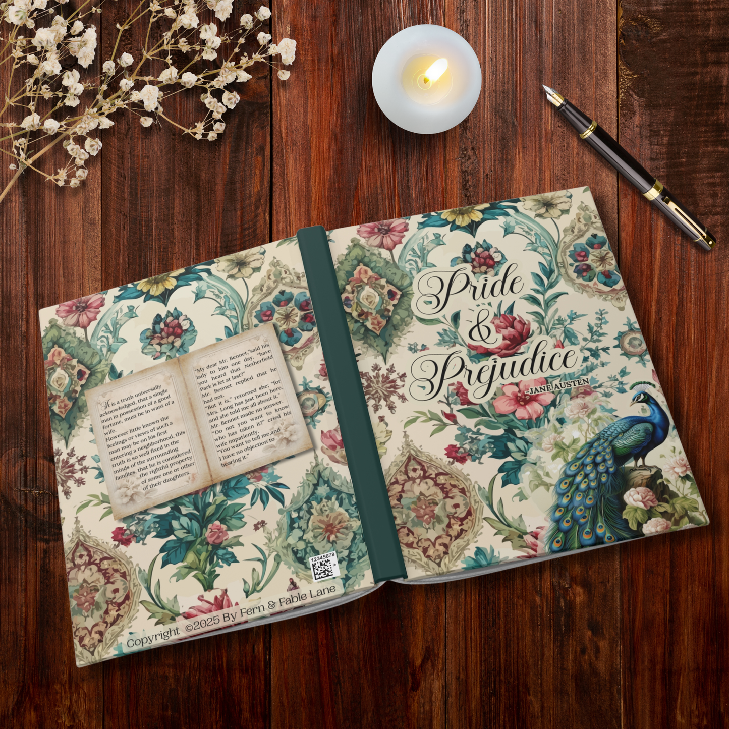Floral notebook titled 'Pride & Prejudice' on a wooden surface with a candle and pen.