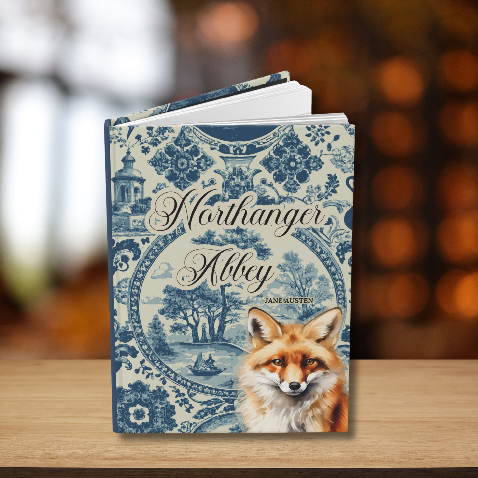 Journal titled 'Northanger Abbey' by Jane Austen with a fox illustration on a blue toile background