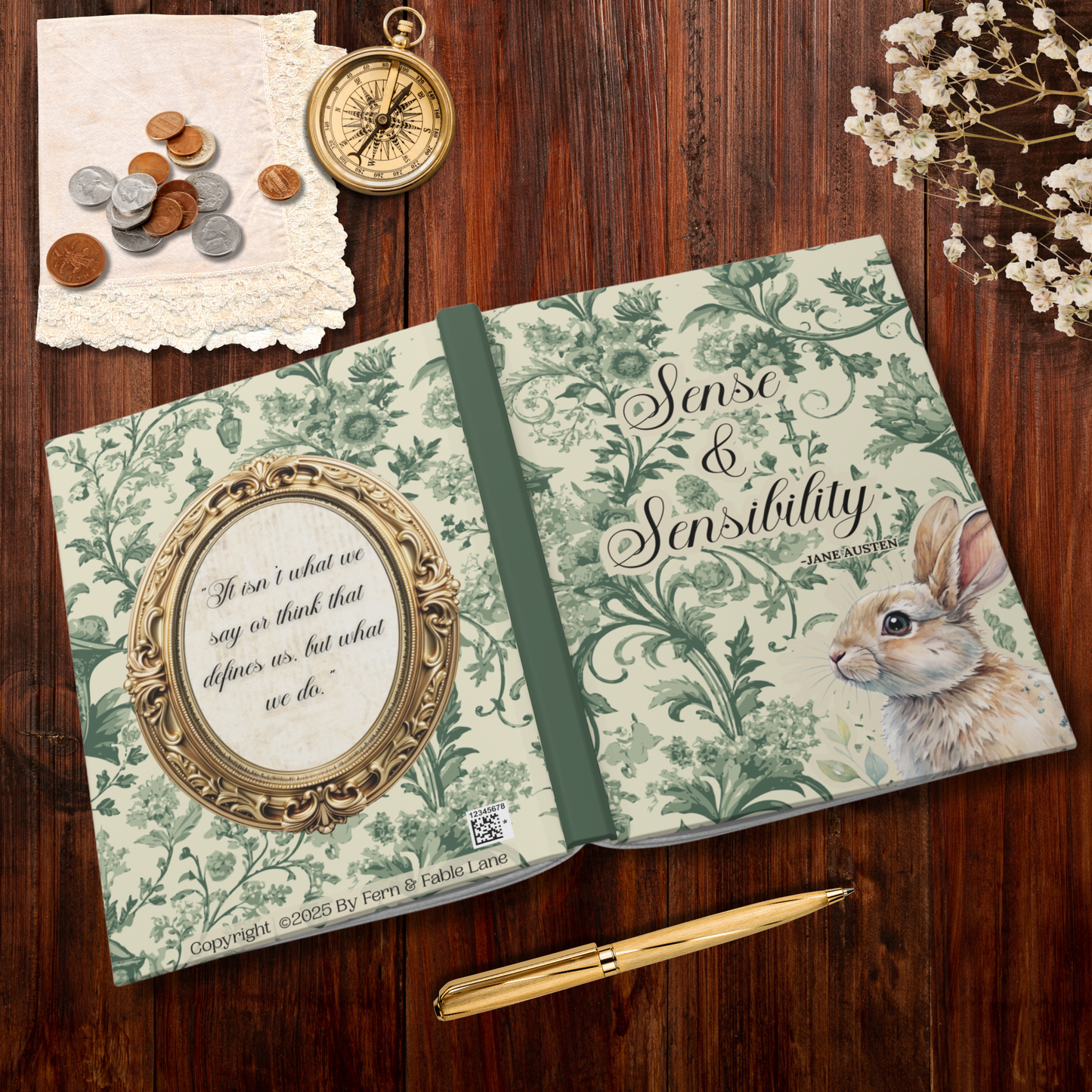 Decorative notebook with green toile design, rabbit illustration, and Jane Austen quote on a wooden surface.