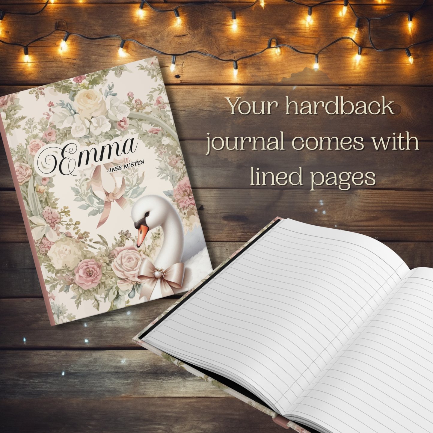 Hardback journal with floral design and swan illustration on a wooden surface with string lights.