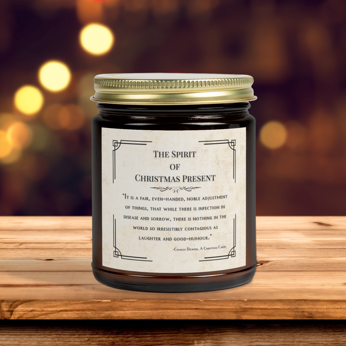 Candle jar labeled 'The Spirit of Christmas Present' on a wooden surface with a blurred festive background.