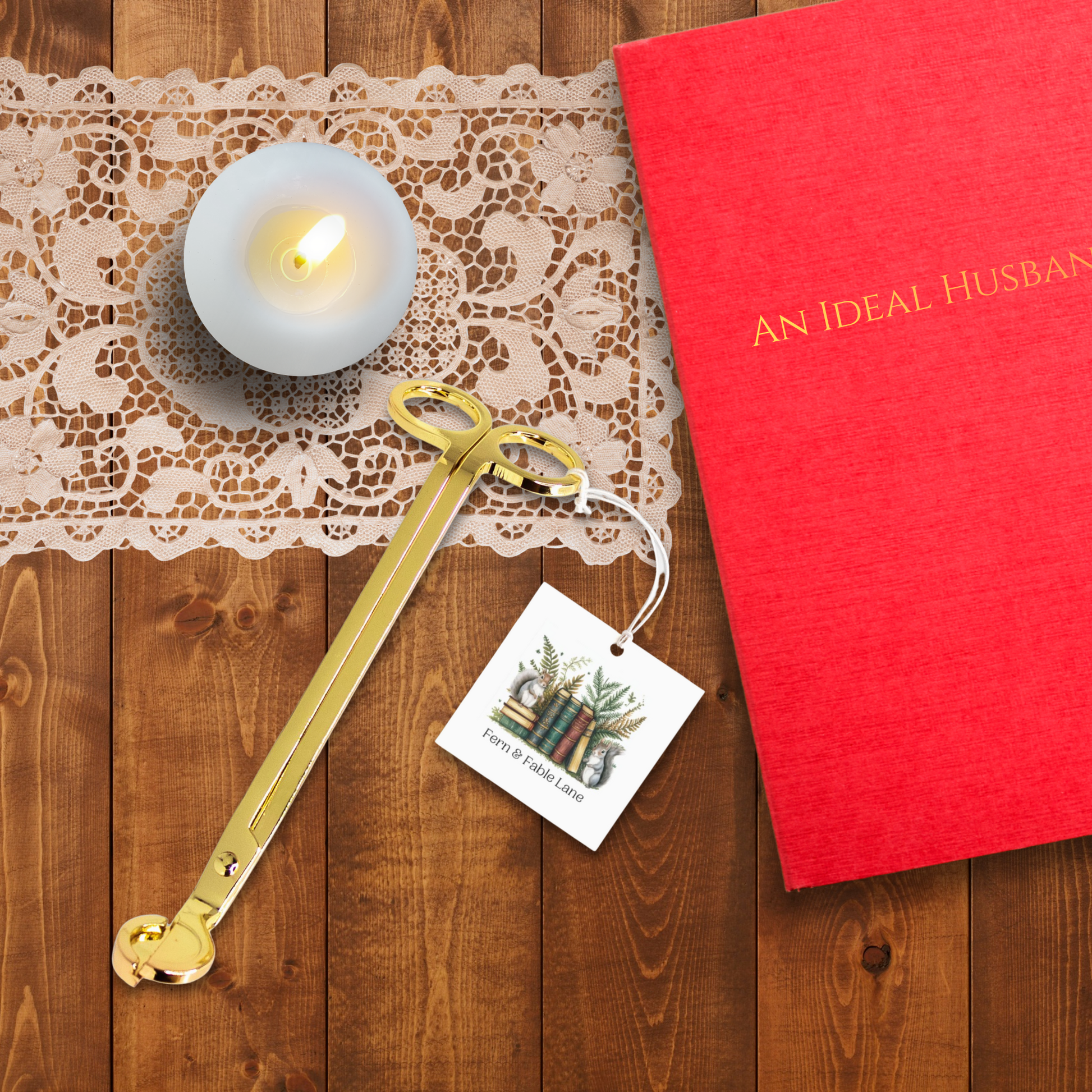 Red book titled 'An Ideal Husband' with a candle and wick trimmer on a wooden surface